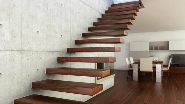 Для помещения, сделанного в стиле минимализм, хорошо подойдет деревянная лестница, ступени которой крепятся с помощью клея к стене 