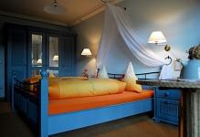 charm-blue-bedroom-yellow-linen-interior-design-ideas