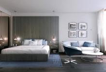 hotel-room-decor-with-picture-frame-and-white-sofa-and-white-round-table